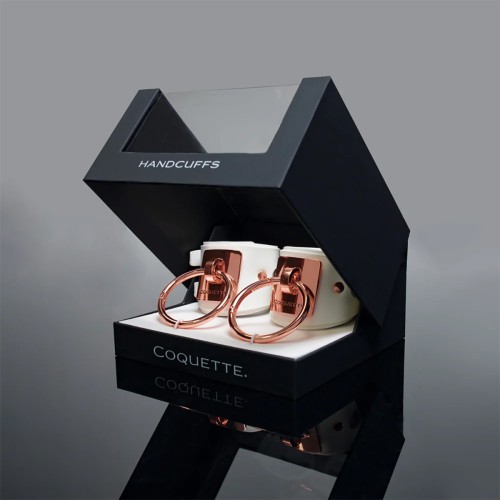 Coquette Pleasure Collection Adjustable White Faux Leather Handcuffs