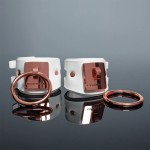 Coquette Pleasure Collection Adjustable White Faux Leather Handcuffs